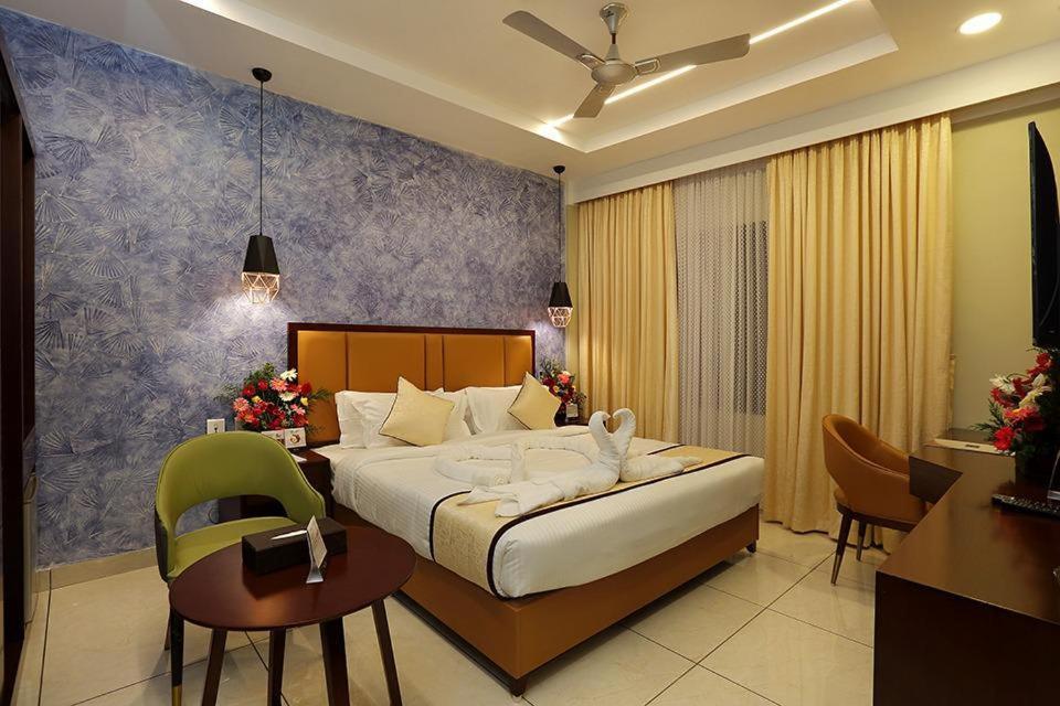 Hotel New York Square Kottayam Buitenkant foto