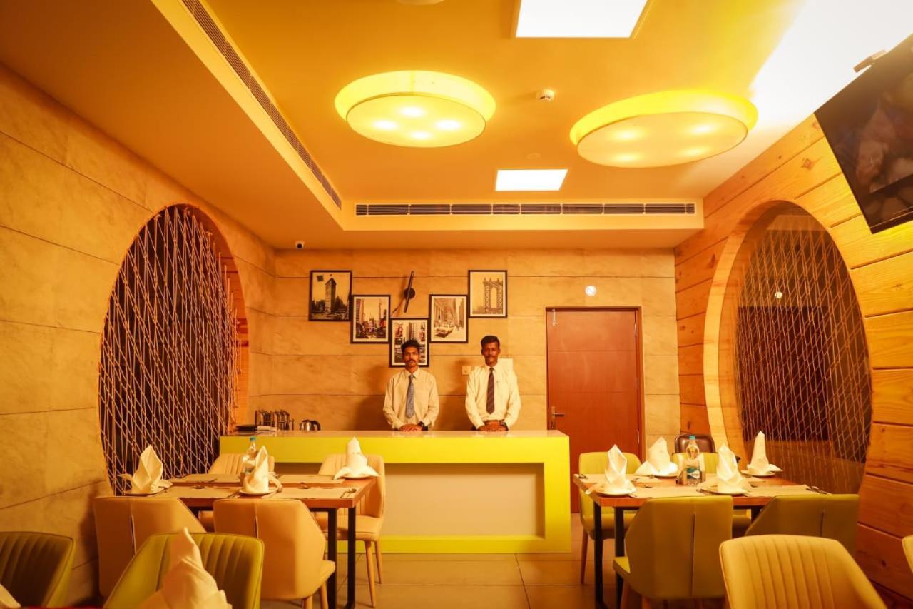 Hotel New York Square Kottayam Buitenkant foto